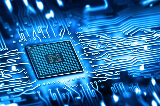 Integrated microchip on a circuit board representing AI compute infrastructure and frontier AI governance policy